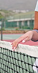 Hands, woman and net on court for tennis, fitness and match practice for competition event. Female person, player or walking on turf with skills, padel contest and sports training for tournament game