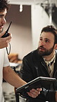 Man, director and producer with tablet for radio, video edit or conversation in production studio. Creative people, filmaker and chat with camera assistant, technology and film making or scene cue