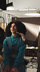 Woman, actress and styling with makeup on set for filming preparation or break in production studio. Happy, female person or actor with stylist, script or getting ready for movie scene or performance