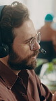 Speaking, agent and man in call center for help, advice or communication for multilingual support. Customer service, headset and person with feedback for language translation, contact us or coworking