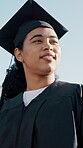 Future, graduation and thinking with woman outdoor for ceremony at college or university. Knowledge, milestone and vision with happy graduate at event for higher education or scholarship success