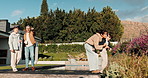 New home, relocation and property with family in backyard for investment, loan or mortgage. Real estate, showing and walking with people outdoor at dream house for development, finance or growth