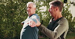 Senior man, exercise and stretching with personal trainer, wellness and fitness routine in backyard. Instructor, talk and warm up with elderly person for health, physical activity or workout at house