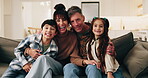 Family, children and face with hug on sofa for comfort, bonding or weekend together in home. Portrait, mom and dad with kids, smile or embrace on couch for childhood, holiday break or love in house