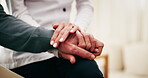 Holding hands, home and senior person with caregiver, comfort and wellness in health community. People, closeup and elderly patient with support, retirement or help with compassion or medical service