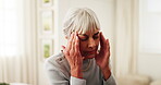 Home, massage and senior woman with headache from hypertension, discomfort and chronic pain. Retirement health, pensioner and tension migraine in house from high blood pressure, vertigo and dizziness