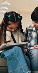 Children, relax and reading in home with tablet, browsing and download ebook for education. Family, kids and streaming in lounge with digital, watching video and educational games for online learning