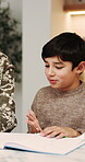 Homework, grandmother and child with counting in home for math, problem solving or learning support. Homeschool, family and kid with book for education, activity help and writing answer for equation
