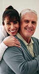 Face, caregiver and old man with homecare, smile and health support with assisted living. People, retirement and portrait of carer with happiness, wellness and medical service with trust in house