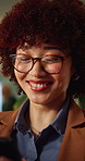 Businesswoman, glasses and chat with phone in office, online or search for financial update at night. Wealth manager, texting and happy person with mobile, working late and research with technology