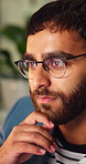 Thinking, online and businessman with glasses in business, research and financial update on website. Serious, treasury manager and person with eyewear, reflection and risk assessment with information