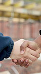 Engineer, meeting and handshake at site for construction, welcome and partnership for architecture. People, team and shaking hands for introduction, agreement and inspection for building development