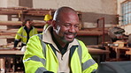 Carpenter, man and smile in workshop with laptop, good news and email for woodwork procurement offer. Mature person, carpentry manager and happy with computer, reading online order or production deal