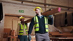 Carpenter, wood and team with men in warehouse for furniture, manufacturing and artisan. Woodworking, production and joinery factory with people walking in workshop for timber, lumber and help