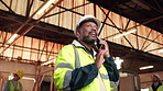 Carpenter, man and talk in workshop with phone call, planning and update for woodwork manufacturing. Low angle, mature person and discussion with tech, contact and feedback for carpentry production.