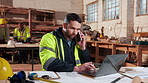 Phone call, man and civil engineer with blueprint on site for building, renovation or repairs. Laptop, floor plan and construction worker on mobile discussion for feedback on architecture design.