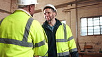 Meeting, shaking hands and men with welcome in woodwork warehouse for building or planning. Manufacturing, factory team and people with handshake for workshop, safety and compliance or maintenance