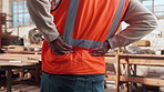 Man, hands and construction worker on site with back pain, injury or accident with muscle sprain. Contractor, arthritis and civil engineer with bad posture for inflammation, sore or spinal bruise.