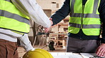 Handshake, men and civil engineers on site with deal, partnership or agreement on building. Meeting, shaking hands and construction worker with contractor for maintenance, renovation or repairs.
