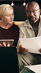 Tablet, interracial couple and financial paperwork in home, mortgage planning and budget review. Savings, mature man and woman in apartment with tech, expenses and discussion with tax document