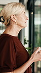 Thinking, window and woman with tea in home, remember memory and nostalgia on break with peace. Thoughts, morning drink and mature person at house with vision, introspection or view with reflection