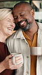 Love, support or interracial couple in house with coffee, partner care or bonding together in morning. Smile, loyalty or mature people with mug, romantic moment or happy relationship at start of day.