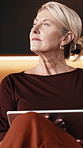 Woman, thinking and remote work in home with tablet, smile and creative inspiration for writing ebook. Mature person, reflection and freelance writer in lounge with tech, idea and plan online story.