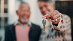 Senior, couple and hands with keys in new home for property investment or retirement together. Access, homeowners or elderly man with woman for mortgage loan, asset management or shelter in house