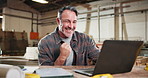 Man, fist pump and carpenter in workshop with laptop for research on furniture manufacturing. Computer, good news and mature woodworker with email for order confirmation with contact in warehouse.