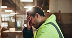 Man, carpenter or stress with headache for mistake, supplier issue or distribution fail in warehouse. Frustrated, male person or contractor with lens flare, helmet or migraine for delivery deadline