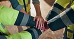 Warehouse, people and hands together with team in huddle for unity, solidarity or synergy. Group, contractor or piling with stack, trust or support for distribution meeting, supply chain or inclusion