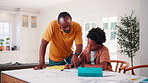 Father, son and help in house with homework, learning math and conversation for child development. Black man, kid and discussion in home with notebook, writing and teaching knowledge for education.