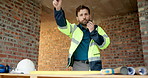 Construction site, radio and man talking for development, work coordination and maintenance request. Communication, architect and person with building inspection, safety compliance or progress report