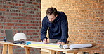 Man, architect and drawing on construction site for blueprint, inspection or update planning. Infrastructure, quality control and person with laptop, report or project management for renovation