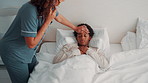 Phone call, help and mom with sick child on bed, health check and monitor body temperature in house. Mobile, healthcare and person with worry for boy with flu symptoms, talk or medical advise in home