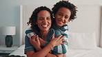Happy, hug and face of mother with kid on bed in home for bonding, love and connection together. Smile, relax and portrait of child embracing mom for safety, support and trust in family at house.