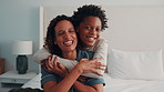 Smile, hug and face of mom with child on bed in home for bonding, love and connection together. Happy, relax and portrait of kid embracing mother for safety, support and trust in family at house.