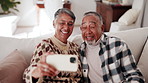 Selfie, happy and senior couple on sofa in home with bonding, love and connection in marriage. Smile, relax and elderly man with woman in retirement with photography picture for memory at house.