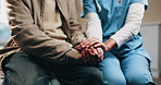 Senior, man and holding hands in nursing home with caregiver, understanding and compassion for grief. Nurse, elderly person and comfort in retirement center with support, kindness and healthcare.
