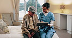 Caregiver, talk and old man in nursing home with tablet, explain health insurance and wellness advice. Happy, nurse and elderly person in bedroom with tech, check medical aid and healthcare support.