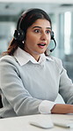 Surprise, business and woman with headset at call centre, good news or positive feedback for crm. Shocked, team or high five in office for celebration, sales goals and achievement of customer service