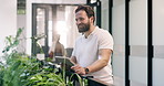 Creative, thinking and happy man with tablet in office for schedule, project or development. Thoughtful, male person or designer with smile or technology for agenda, tasks or improvement in workplace