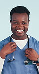 Surgeon, face or happy with stethoscope in studio for medical service, cardiology intern or pride. Doctor, black man or laugh on blue background for medicine expertise, career integrity or confidence