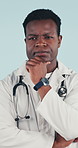 Thinking, black man and doctor in studio with planning, decision or problem solving for medical career. Doubt, reflection and healthcare worker on blue background with solution, ideas or choice.