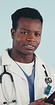 Face, doctor and black man in studio with tablet, career experience and internet for medical research. Happy, healthcare worker and person with tech, positive attitude or about us on blue background.