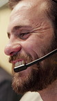 Headset, talk and happy man in call center for customer support, banking feedback and communication. Contact us, help and person speaking for advice, account assistance and coworking with smile