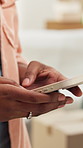 Phone, hands and person typing in new home with app for real estate, property loan or interior design. Internet, relocation and woman with mobile in house for bond, mortgage info or online search