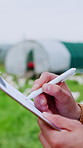 Clipboard, hands and farmer with pen outdoor, poultry farm and sustainable business with planning or checklist. Person, agriculture and livestock with paperwork, writing or review for quality control