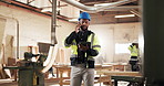 Man, carpenter and phone call at workshop with tablet, research and contact for timber production. Male person, talking or tech at factory for carpentry, supplier approval and manufacturing furniture