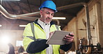 Man, engineer and review at workshop with tablet, research and inspection report for construction. Mature person, reading and supervisor at site with tech, quality control and agenda for architecture